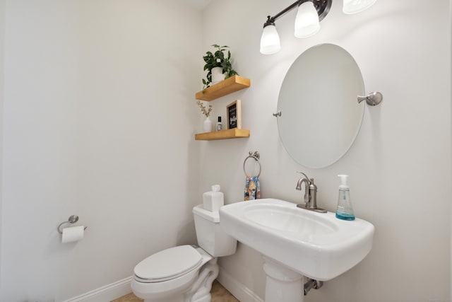 35 Bart Dr, Canton, CT 06019 - half bathroom featuring toilet, baseboards, and a sink