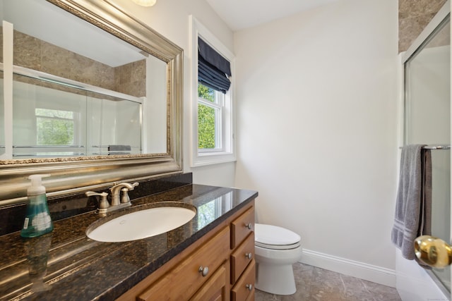 35 Bart Dr, Canton, CT 06019 - full bathroom with vanity, a stall shower, toilet, and baseboards
