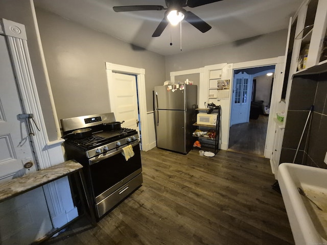 80 N St, Windham, CT 06226 - kitchen featuring stainless steel appliances, dark wood-style floors, a ceiling fan, and white cabinets