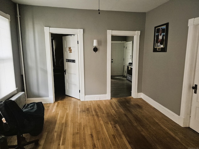 80 N St, Windham, CT 06226 - dining area featuring baseboards, wood finished floors, and radiator heating unit