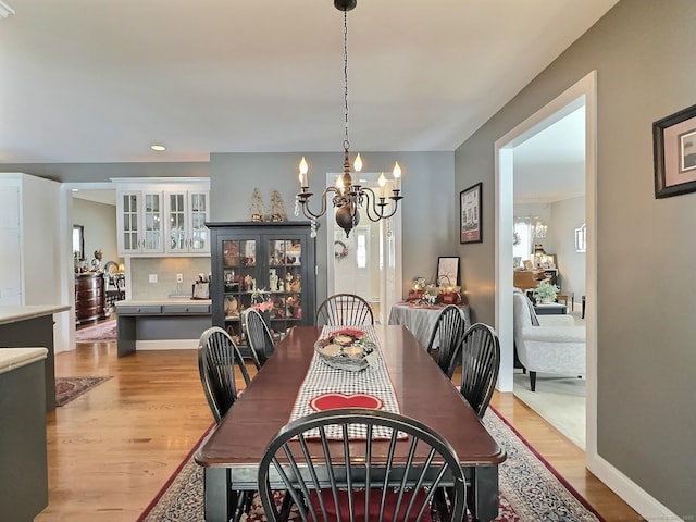 16 Trevor Ln, East Granby, CT 06026 - dining area featuring a chandelier, light wood finished floors, and recessed lighting