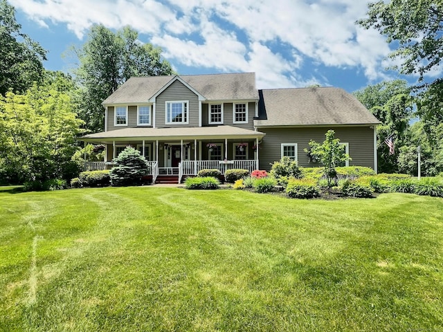16 Trevor Ln, East Granby, CT 06026 - colonial-style house featuring a front yard and a porch