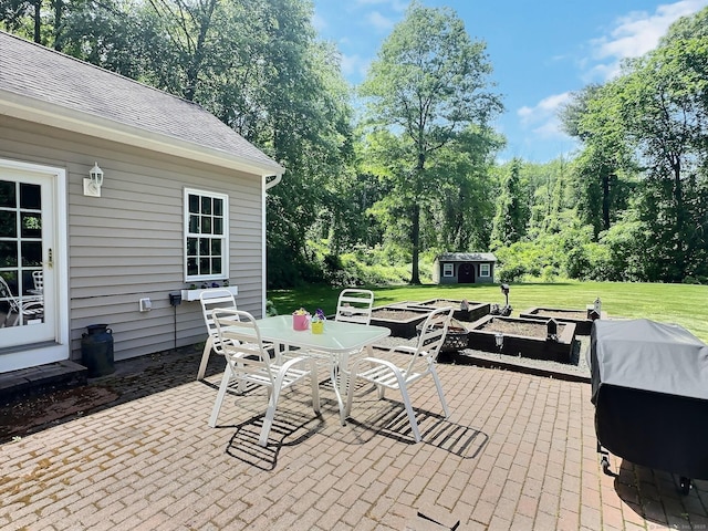 16 Trevor Ln, East Granby, CT 06026 - view of patio / terrace with outdoor dining space and a grill