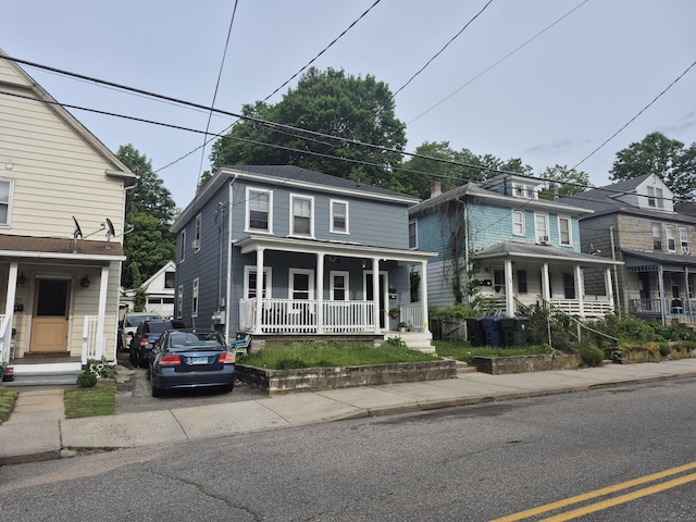 96 S St, Windham, CT 06226 - view of front facade with a porch