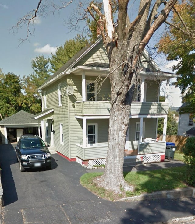 100 Roosevelt Ave, Torrington, CT 06790 - view of front of home with a balcony and covered porch