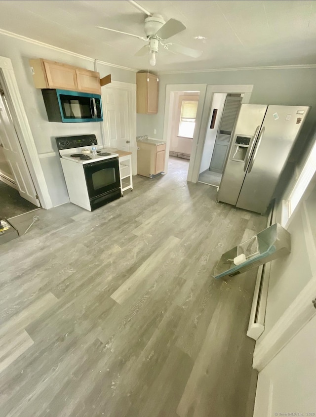 100 Roosevelt Ave, Torrington, CT 06790 - kitchen with electric range oven, stainless steel fridge, light wood finished floors, light brown cabinetry, and ceiling fan