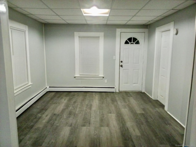 100 Roosevelt Ave, Torrington, CT 06790 - foyer featuring a paneled ceiling, wood finished floors, and baseboards