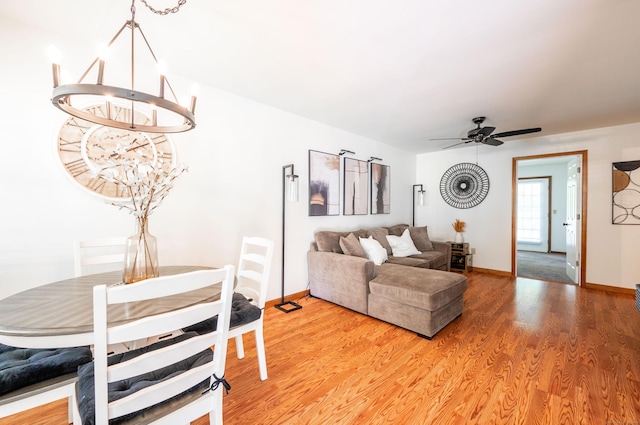 13 Hidden Knolls Cir Unit 13, Monroe, CT 06468 - living area with a ceiling fan, light wood-type flooring, baseboards, and a chandelier