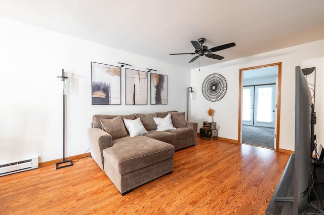 13 Hidden Knolls Cir Unit 13, Monroe, CT 06468 - living area with ceiling fan, light wood finished floors, baseboard heating, and baseboards