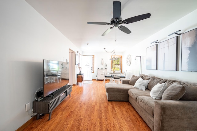 13 Hidden Knolls Cir Unit 13, Monroe, CT 06468 - living room featuring light wood-style flooring, baseboards, a chandelier, and ceiling fan