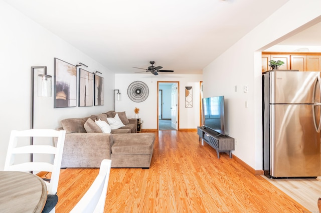 13 Hidden Knolls Cir Unit 13, Monroe, CT 06468 - living area featuring light wood-style flooring, a ceiling fan, and baseboards