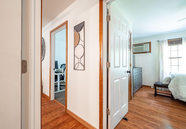 13 Hidden Knolls Cir Unit 13, Monroe, CT 06468 - hallway featuring light wood-style floors, baseboards, and a wall mounted AC