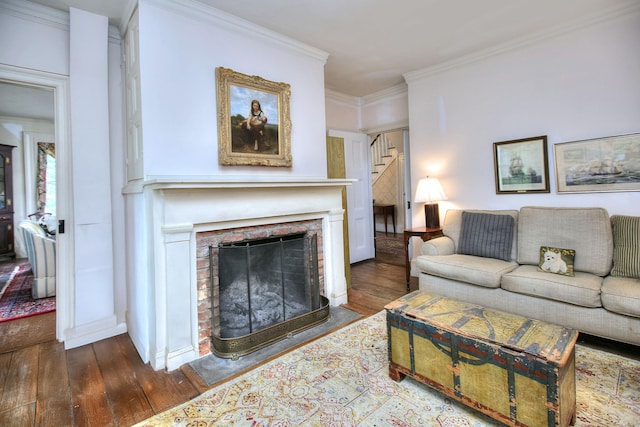 587 Carter St, New Canaan, CT 06840 - living area featuring hardwood / wood-style flooring, crown molding, a fireplace, baseboards, and stairs