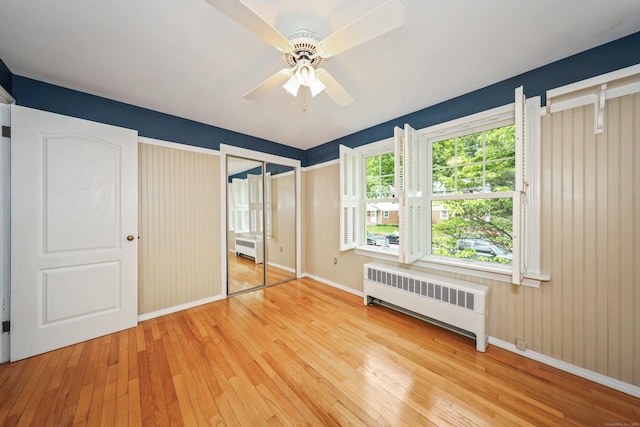 70 Cold Spring Cir, Naugatuck, CT 06770 - unfurnished bedroom with radiator heating unit, baseboards, and hardwood / wood-style floors