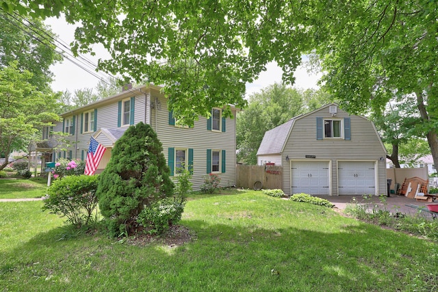 70 Cold Spring Cir, Naugatuck, CT 06770 - colonial house featuring a garage, a gambrel roof, and an outbuilding