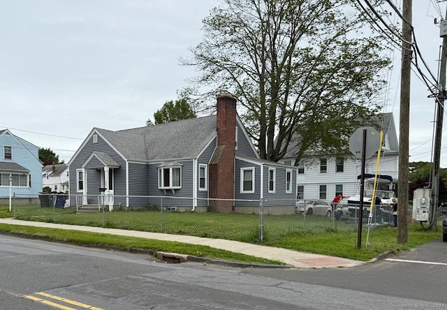 240 Beechmont Ave, Bridgeport, CT 06606 - view of front of home with a chimney and roof with shingles