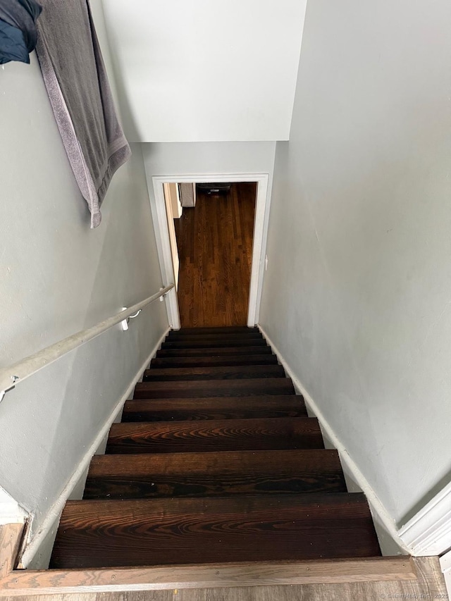 240 Beechmont Ave, Bridgeport, CT 06606 - stairs featuring wood finished floors and baseboards