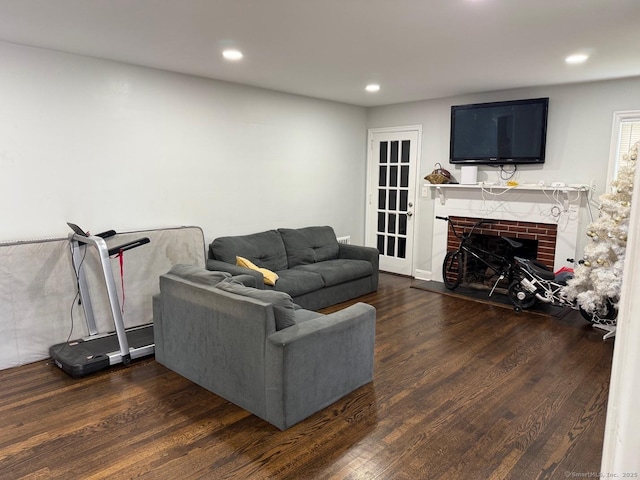 240 Beechmont Ave, Bridgeport, CT 06606 - living area with dark wood-type flooring, recessed lighting, and a fireplace