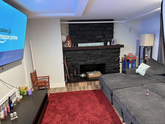 240 Beechmont Ave, Bridgeport, CT 06606 - living area featuring a fireplace and wood finished floors