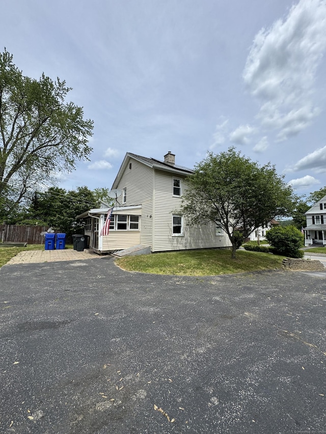 160 New Litchfield St, Torrington, CT 06790 - view of property exterior featuring a chimney