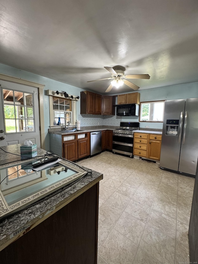 160 New Litchfield St, Torrington, CT 06790 - kitchen with appliances with stainless steel finishes, a sink, healthy amount of natural light, and ceiling fan