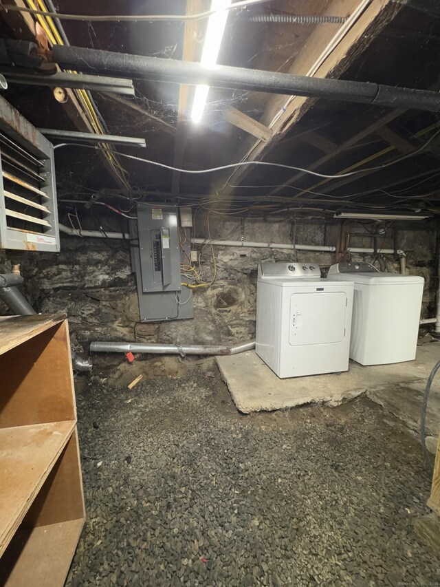 160 New Litchfield St, Torrington, CT 06790 - unfinished basement featuring electric panel, separate washer and dryer, and a heating unit