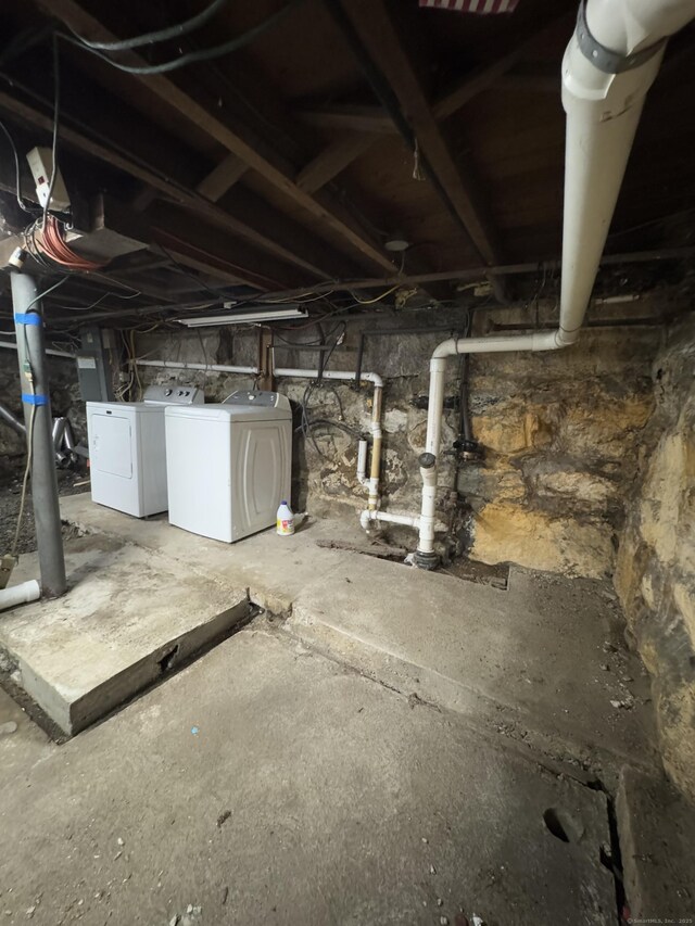 160 New Litchfield St, Torrington, CT 06790 - unfinished basement featuring washer and clothes dryer