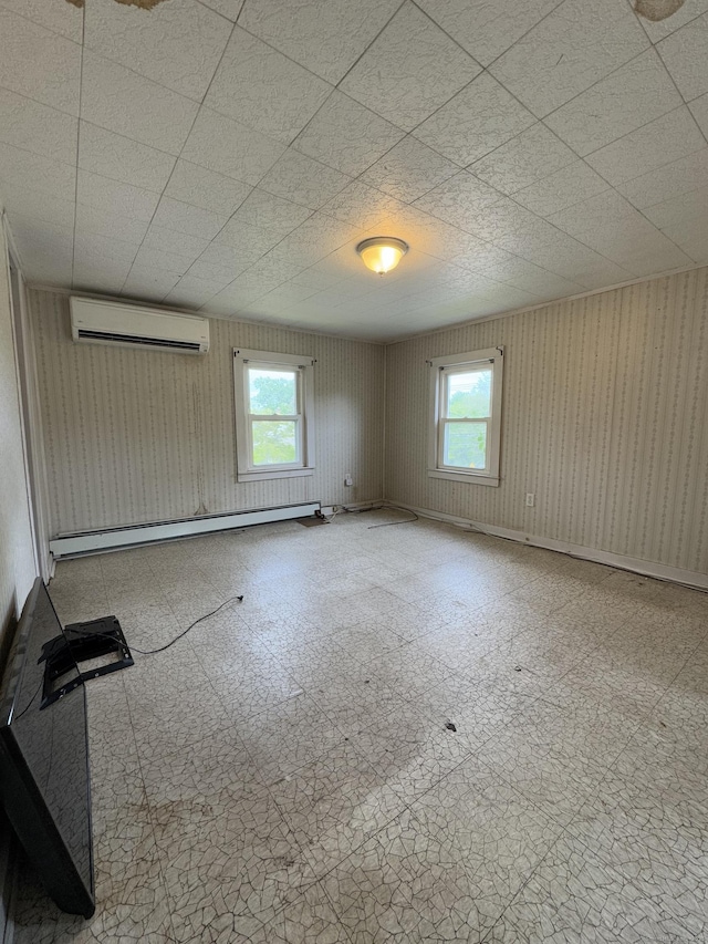 160 New Litchfield St, Torrington, CT 06790 - unfurnished room with a wall mounted air conditioner, a baseboard radiator, and plenty of natural light
