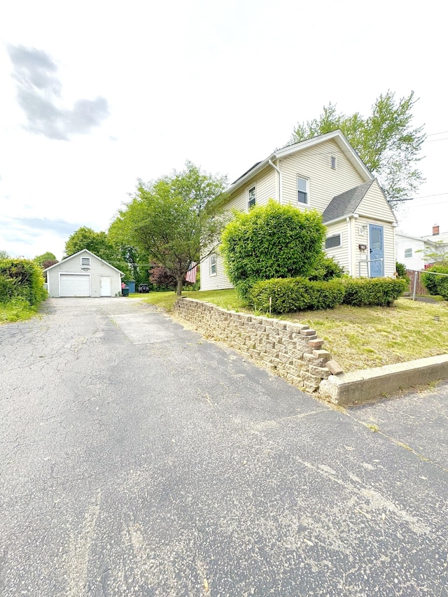 160 New Litchfield St, Torrington, CT 06790 - view of side of property featuring an outdoor structure and a garage