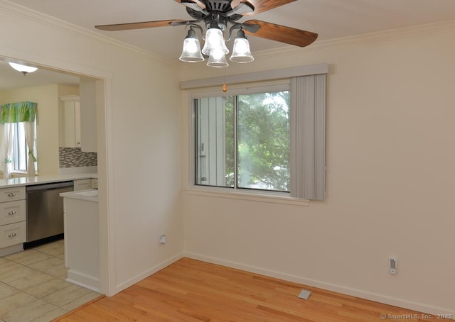 8 Heritage Vlg Unit D, Southbury, CT 06488 - unfurnished dining area featuring a ceiling fan, ornamental molding, baseboards, and light wood finished floors