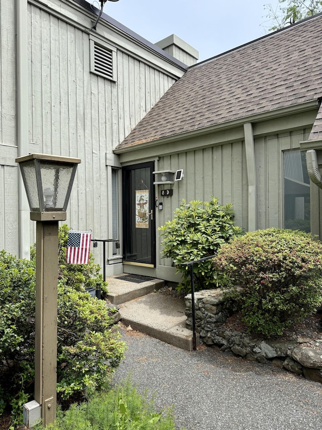 8 Heritage Vlg Unit D, Southbury, CT 06488 - doorway to property with roof with shingles