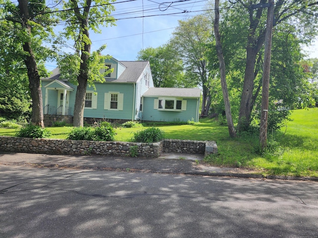 23 Capewell Ave, Watertown, CT 06779 - cape cod home featuring a front lawn