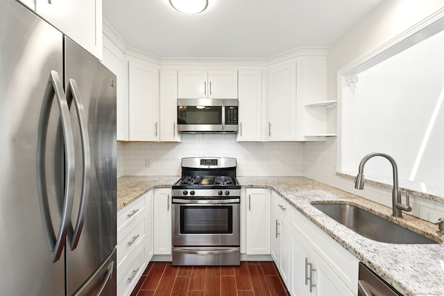 27 Pheasant Run Unit 27, Cromwell, CT 06416 - kitchen featuring stainless steel appliances, a sink, dark wood-type flooring, and white cabinets
