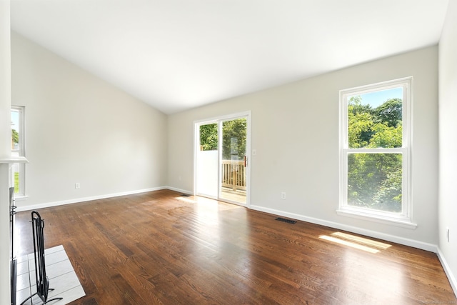 27 Pheasant Run Unit 27, Cromwell, CT 06416 - spare room featuring dark wood-style floors, baseboards, and vaulted ceiling