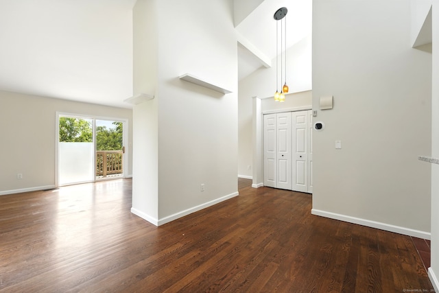 27 Pheasant Run Unit 27, Cromwell, CT 06416 - entryway featuring high vaulted ceiling, baseboards, and dark wood-style floors