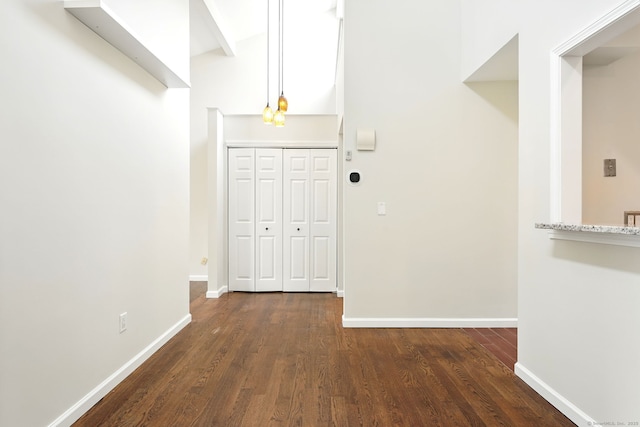 27 Pheasant Run Unit 27, Cromwell, CT 06416 - corridor with baseboards and dark wood-style floors