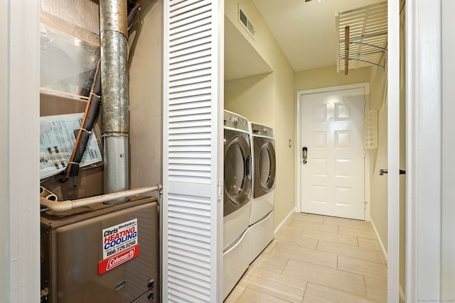 27 Pheasant Run Unit 27, Cromwell, CT 06416 - washroom with washer and dryer and baseboards