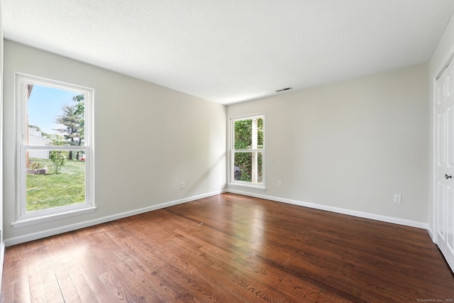 27 Pheasant Run Unit 27, Cromwell, CT 06416 - unfurnished room with dark wood-style flooring and baseboards