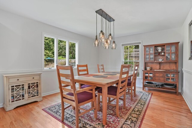 7 Silva Ter, Oxford, CT 06478 - dining space featuring light wood-style flooring and a chandelier