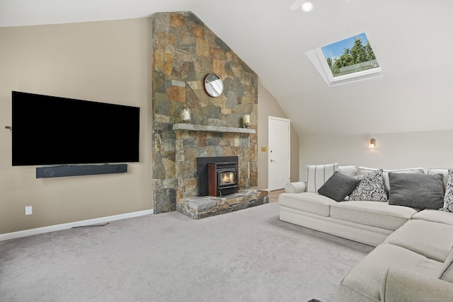 7 Silva Ter, Oxford, CT 06478 - living area featuring lofted ceiling, a skylight, baseboards, carpet flooring, and a wood stove