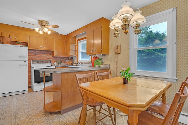 30 Fairlawn Rd, Glastonbury, CT 06033 - kitchen with white appliances, open shelves, a peninsula, a ceiling fan, and wallpapered walls