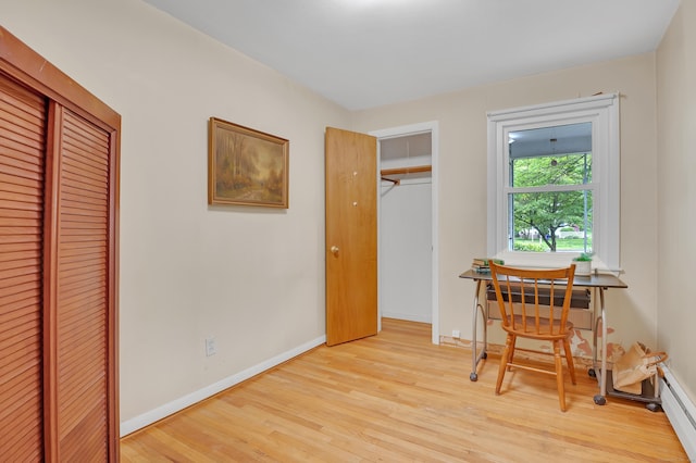 30 Fairlawn Rd, Glastonbury, CT 06033 - home office with light wood-style floors, baseboards, and a baseboard radiator