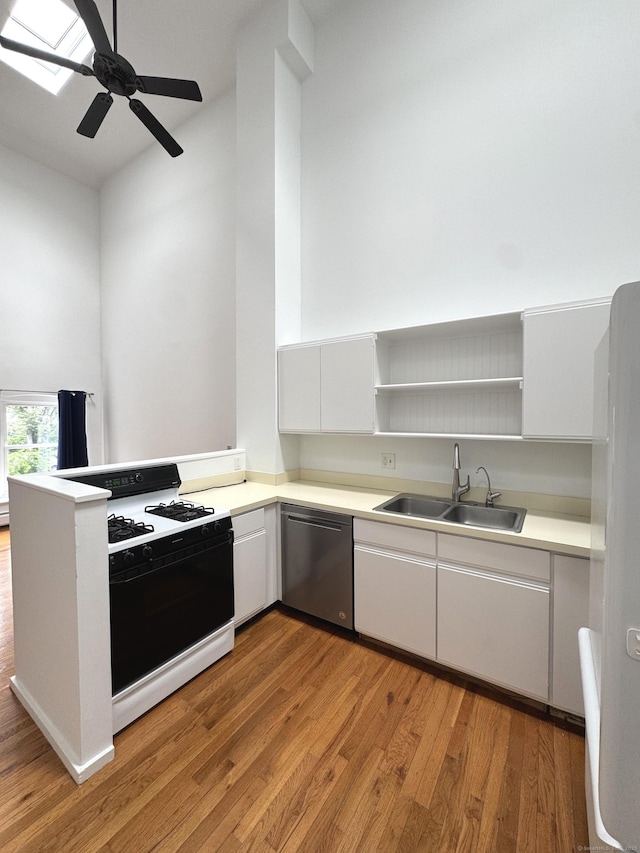 32 Pine St Unit 12Aka 15, Norwalk, CT 06854 - kitchen with dishwasher, range with gas stovetop, a sink, and light wood-type flooring