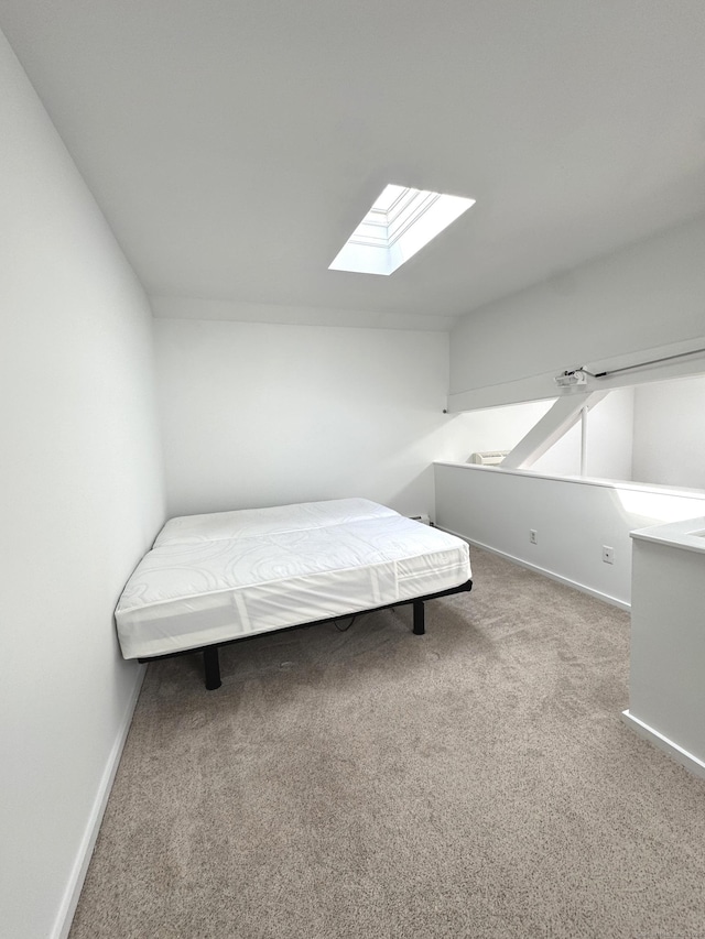 32 Pine St Unit 12Aka 15, Norwalk, CT 06854 - carpeted bedroom with a skylight and baseboards