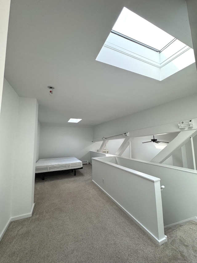 32 Pine St Unit 12Aka 15, Norwalk, CT 06854 - bonus room with a skylight, carpet flooring, and baseboards