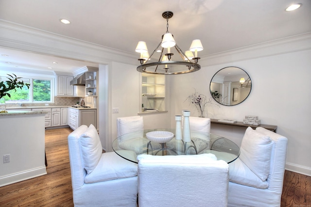 52 Woodside Ave, Westport, CT 06880 - dining space with a chandelier, light wood finished floors, crown molding, and recessed lighting