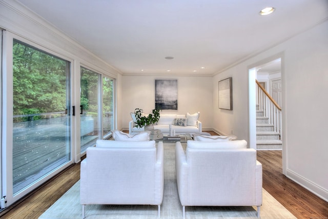 52 Woodside Ave, Westport, CT 06880 - living room with ornamental molding, wood finished floors, stairway, and recessed lighting