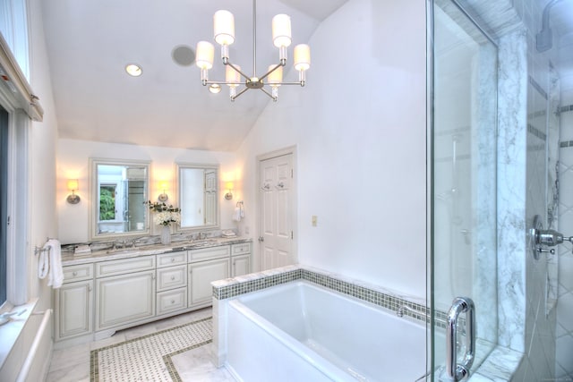 52 Woodside Ave, Westport, CT 06880 - bathroom featuring vaulted ceiling, a garden tub, double vanity, a stall shower, and a chandelier