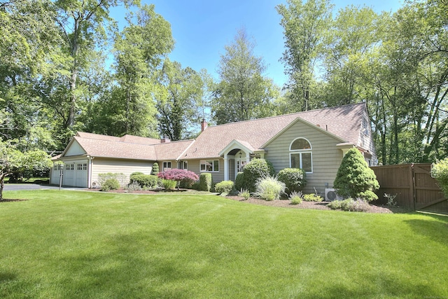 52 Woodside Ave, Westport, CT 06880 - single story home with a garage, driveway, a chimney, and roof with shingles