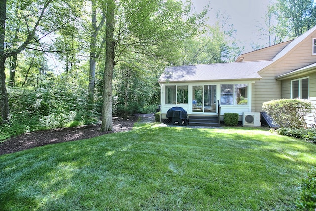 52 Woodside Ave, Westport, CT 06880 - view of green lawn featuring a sunroom and entry steps